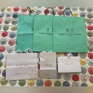 6 fancy shopping bags (3 Dior, 3 Fortnum & Mason)